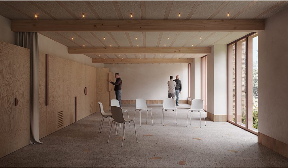 Salle associative avec sol en béton et mobilier bois
